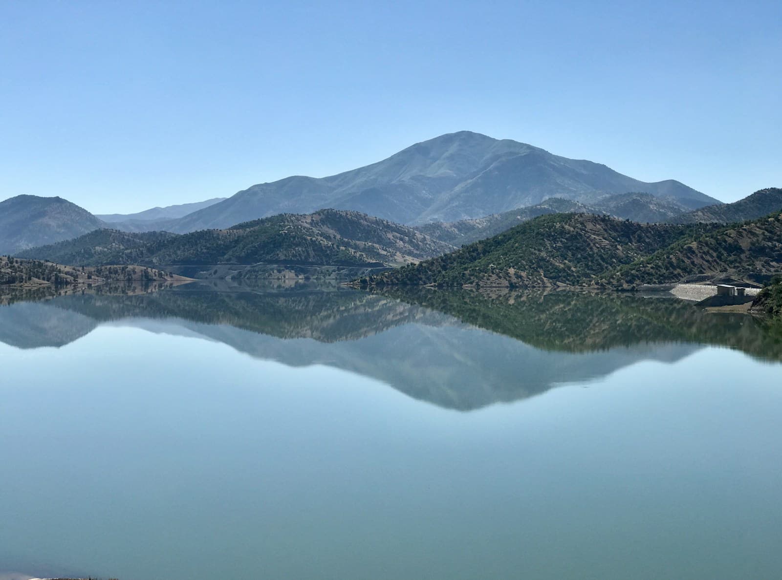 a large body of water surrounded by mountains