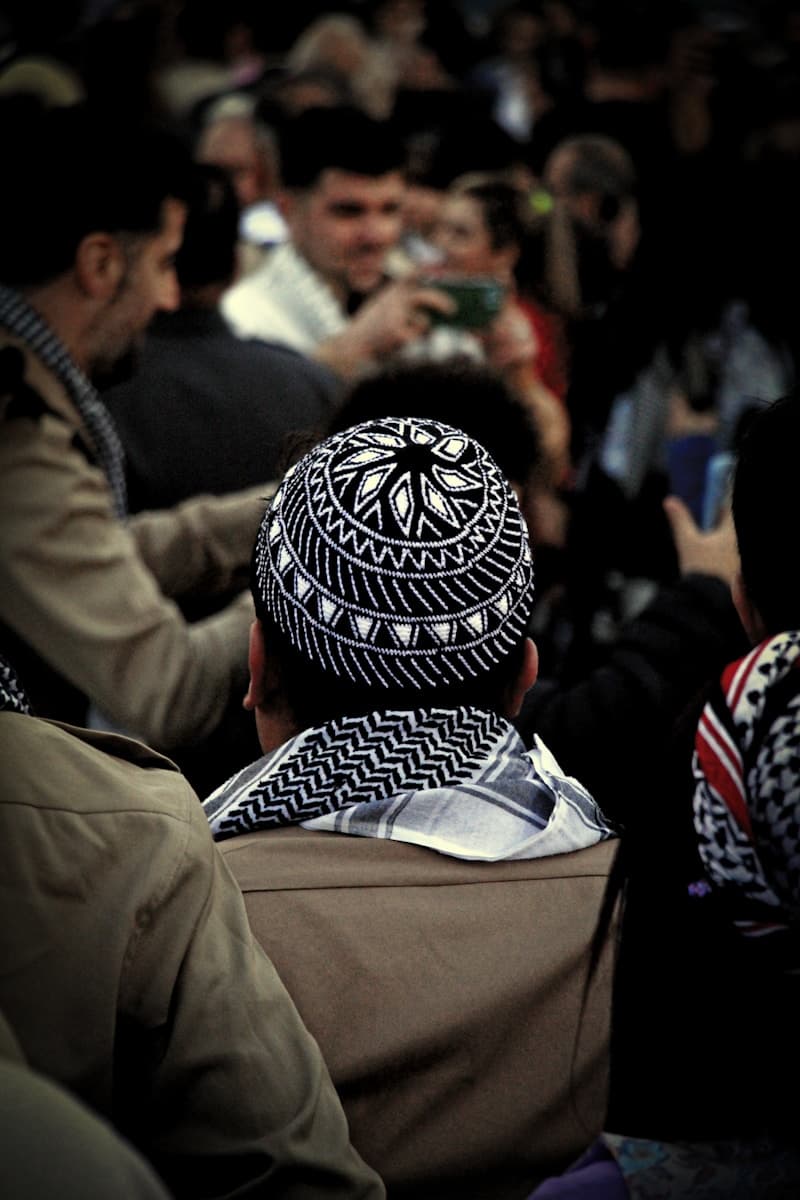 a group of people sitting next to each other